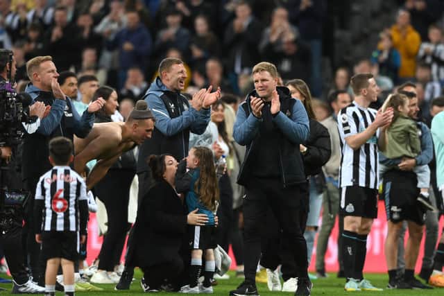 Newcastle United head coach Eddie Howe celebrates Champions League qualification.