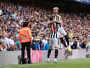 Anthony Gordon celebrates his first Newcastle United goal with Elliot Anderson.