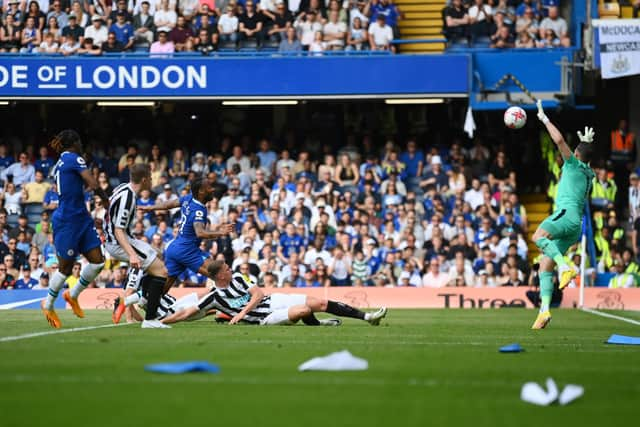 Martin Dubravka denies Raheem Sterling at Stamford Bridge.