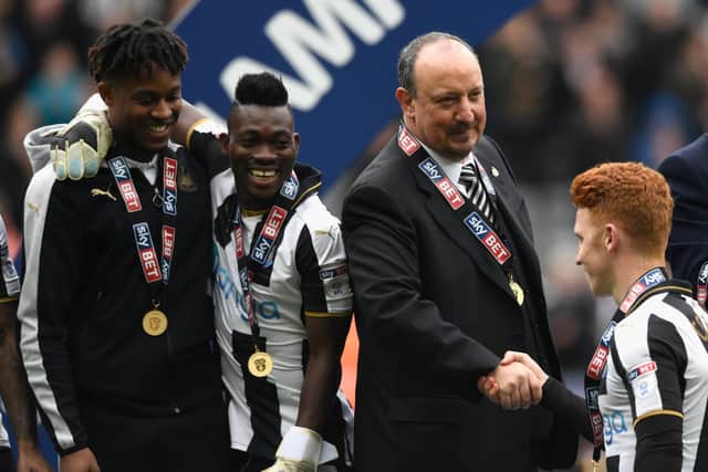 Jack Colback, far right, shakes Newcastle United manager Rafa Benitez's hand as Newcastle United's players celebrating their Championship title in 2017.