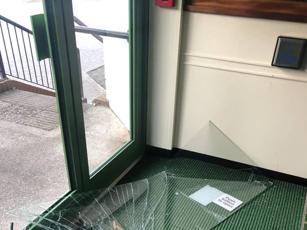 The entrance doors to the Westovians were smashed.