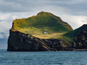 ElliÃ°aey (Icelandic pronunciation: is a small island south of Iceland. It is the most northeastern of the Vestmannaeyjar (Westman Islands), an archipelago consisting of 15 to 18 islands and assorted smaller rocks.