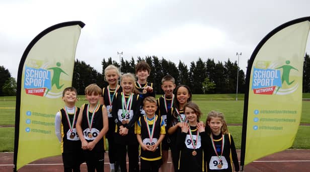St. Bede’s Catholic Primary School’s winning Y3/4 athletics team.