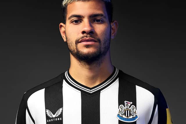 Bruno Guimaraes models Newcastle United's new home kit.