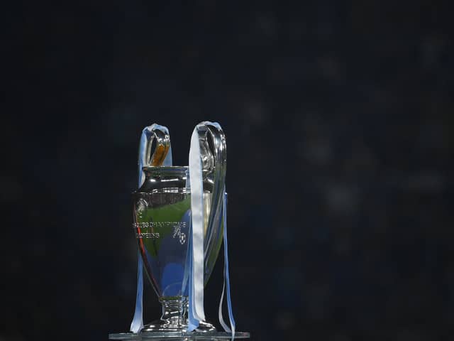 The Champions League trophy (AFP via Getty Images). 