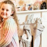 Little Angel-Mae Dawson has been left unable to walk properly after she was viciously mauled by a German Shephard outside her home in Meir, Stoke-on-Trent.