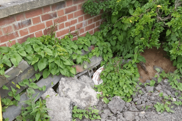 Rubble is still at the entrance to the estate.