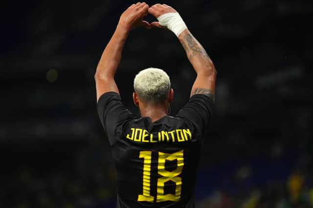 Newcastle United's Joelinton celebrates scoring for Brazil against Guinea.