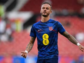 James Maddison warms up for England