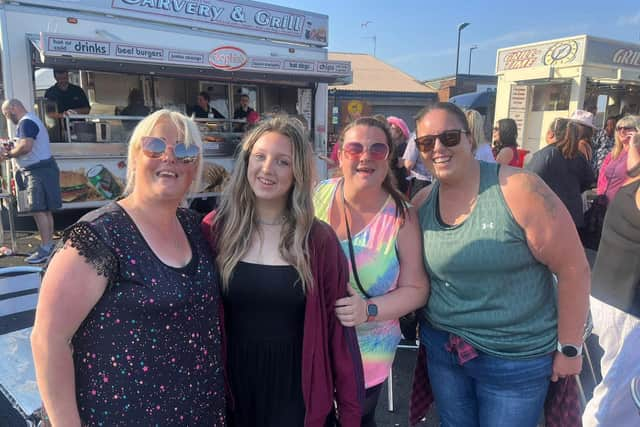 Lily Cooke with the women who offered her the ticket