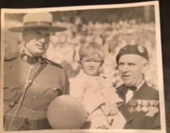 Brian as a child with his grandfather Henry Howey Robson in 1952 when  Queen Elizabeth (then Princess Elizabeth) visited Toronto, Canada.