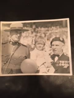 Brian as a child with his grandfather Henry Howey Robson in 1952 when  Queen Elizabeth (then Princess Elizabeth) visited Toronto, Canada.
