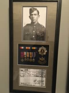 Photo of Henry Howey Robson and his medals 