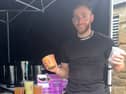 Corey Walker with the bubble teas he's made