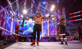 Roman Reigns (left) and Solo Sikoa (right) 