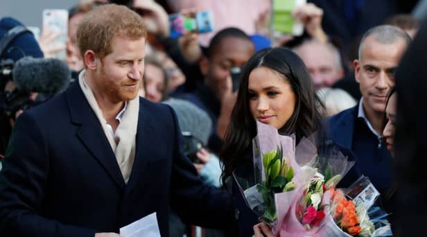 Prince Harry and his then-fiancee, now wife, US actress Meghan Markle arrive to visit the Terrence Higgins Trust World AIDS Day charity fair at Nottingham Contemporary on December 1, 2017