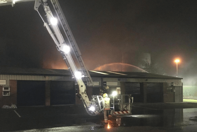 Fire crews deployed two aerial ladder platform vehicles to help tackle the fire. Photo: TWFRS. 