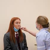 Secondary school children will now get to have their flu vaccinations to reduce the risk of transmission to more vulnerable groups. (Photo by Ian Forsyth/Getty Images)