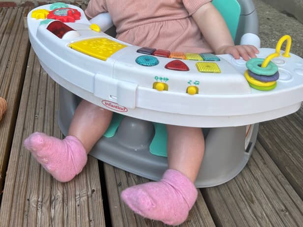 Layla enjoying her activity chair