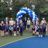 Staff and children celebrate opening of new £50,000 multi use games area 