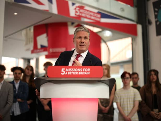Sir Keir Starmer heckled on stage by green protesters who demand ‘no more U-turns’ from Labour leader 