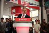 Sir Keir Starmer heckled on stage by green protesters who demand ‘no more U-turns’ from Labour leader 