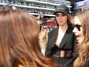 Cara Delevingne has hit back at F1 fans after an awkward encounter with Sky Sports presenter Martin Brundle