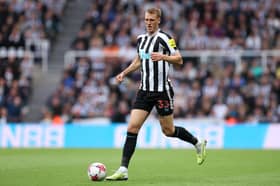 Dan Burn in action for Newcastle United.  
