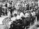 Bank Holiday crowds at the South Marine Park in August 1980. They are watching as a steam engine takes another load of passengers for a trip around the lake. Photo: Shields Gazette
