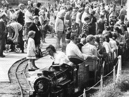 Bank Holiday crowds at the South Marine Park in August 1980. They are watching as a steam engine takes another load of passengers for a trip around the lake. Photo: Shields Gazette
