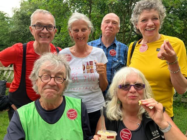 Back, from left, Uli, Ingrid, Martin, Dorothee, front, Wolfgang and Annelie, all enjoying pease pudding. Picture supplied by Dicksons