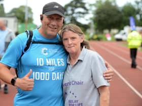 Annual Cancer Research UK Relay for Life organiser Ann Walsh at Monkton Stadium with David Ansell who is walking 10 miles a day for a 100 days.