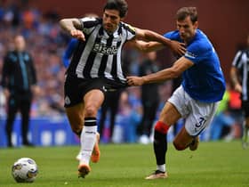 Sandro Tonali of Newcastle United battles with Borna Barisic of Rangers