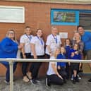 From left: Jay Brunton, Katherine McBride, Sheila Fish, Fiona Richards, Alice Urwin, Emil (middle child), who named the garden, and his family.