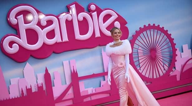 Australian actress Margot Robbie poses on the pink carpet upon arrival for the European premiere of “Barbie” in central London.