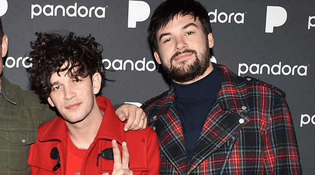 The 1975's set in Malaysia was cancelled after Matty Healy and Ross McDonald kissed on stage - Credit: Getty