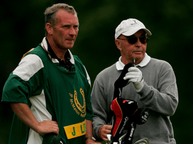 Joe Lewis (right) has been charged with insider trading by a US District Attorney (Credit: Getty)
