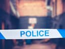 Two police officers were injured in a knife attack following a car crash in south Manchester.
