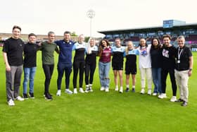 Jade Thirlwall with representatives of the SSFC women’s team, office team and Stonewall. Photo: SSFC.