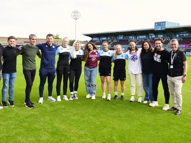 Jade Thirlwall with representatives of the SSFC women’s team, office team and Stonewall. Photo: SSFC.