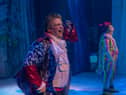 Den-Dini played by Glen Richard Townsend and Arbut-tons played by Davey Hopper.