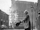 Daily chores being carried out in 1969 i the shadow of the tanker Esso Northumbria, which was to be launched on the Tyne by Princess Anne. Photo: Shields Gazette