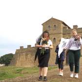 Brook walking with the re-imagined procession from Arbeia to Morrisons 