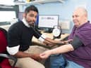Dr Raj Bethapudi with patient Richard, 67, checking his blood pressure