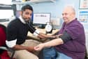 Dr Raj Bethapudi with patient Richard, 67, checking his blood pressure
