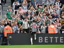 Alexander Isak of Newcastle United celebrates after scoring the team’s second goal with the fans during the Premier League match between Newcastle United and Aston Villa at St. James Park on August 12, 2023 in Newcastle upon Tyne, England. 