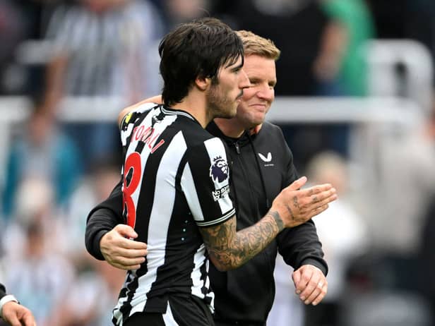  Sandro Tonali and Eddie Howe, Manager of Newcastle United, celebrate after the team's victory in the Premier League match between Newcastle United and Aston Villa at St. James Park on August 12, 2023 in Newcastle upon Tyne, England. (Photo by Stu Forster/Getty Images)