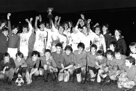 It's March 1983 and the St Joseph's RC under 14s team is pictured standing with the Alexander Murray Cup after beating Hebburn Comprehensive School. Does this bring back memories? Photo: Shields Gazette