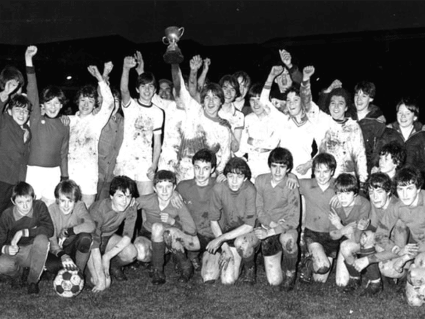 It's March 1983 and the St Joseph's RC under 14s team is pictured standing with the Alexander Murray Cup after beating Hebburn Comprehensive School. Does this bring back memories? Photo: Shields Gazette