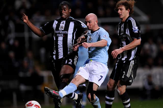 Stephen Ireland scores against Newcastle United for Manchester City.